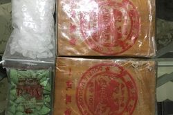Phá đường dây ma túy, thu giữ 2 bánh heroin chuẩn bị phân thành tép