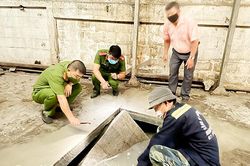 Vụ chôn chất thải tại Công ty CP Bóng đèn Điện Quang: Cơ quan điều tra khởi tố vụ án