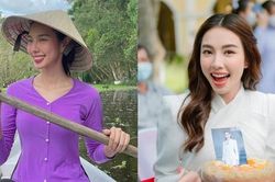 Hoa hậu Thùy Tiên mặc áo bà ba, được tặng bánh bông lan trứng muối khi đến An Giang