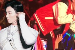 Erik gặp sự cố khi bị fan giật tay, xô ngã nhào xuống sân khấu