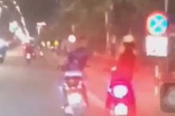 Truy tìm thanh niên đi SH giở 'trò biến thái' với cô gái trên đường Quảng Bình