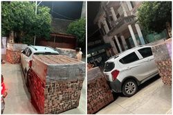 Đỗ xe sai, tài xế ô tô được bà con tặng luôn gạch đá
