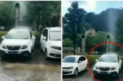 Mưa chỉ trút xuống đúng một chiếc ô tô trong bãi đậu xe đông đúc, có phải 'lỗi do ăn ở'?