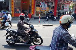 Hiểm họa mất an toàn giao thông từ trang phục chống nắng