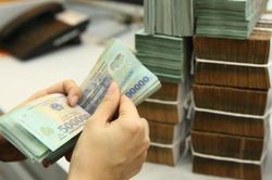 'Room' tín dụng có thể nới thêm 457.000 tỉ đồng trong tuần này