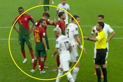 Cầu thủ Bồ Đào Nha bảo vệ chấm phạt đền trước tiểu xảo của Uruguay