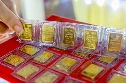 Giá vàng, USD đồng loạt 'hạ nhiệt'