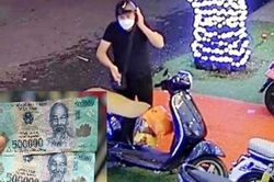 Ăn mặc sang trọng để tiêu thụ tiền giả loại 500.000 đồng