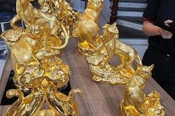 Linh vật mèo mạ vàng có giá trị thực như thế nào?