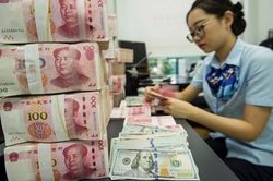Standard Chartered hạ dự báo tỷ giá đồng VND so với USD