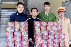 Dùng xe biển Lào vận chuyển 82 hộp pháo về Việt Nam