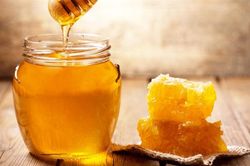 Những tác dụng phụ tiềm ẩn của mật ong