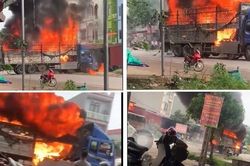 Tài xế liều mình lái xe tải cháy ngùn ngụt ra khỏi đám đông