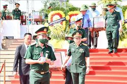 Truy điệu, an táng 19 liệt sỹ là quân tình nguyện, chuyên gia Việt Nam hy sinh tại Lào