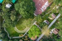 Bất ngờ resort xanh mát hồi sinh từ trang trại chế biến thuốc lá