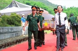 Truy điệu, an táng hài cốt liệt sỹ quân tình nguyện Việt Nam hy sinh tại Lào