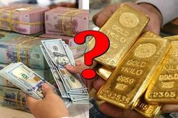 Tiền nhàn rỗi nên mua vàng hay gửi tiết kiệm?