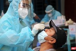 Việt Nam chính thức chuyển bệnh COVID-19 từ nhóm A sang nhóm B
