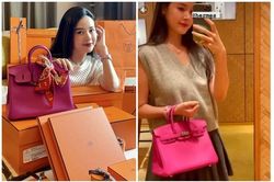 'Ngọc nữ' Midu sắm hàng hiệu cả núi, phải nhờ người hộ tống