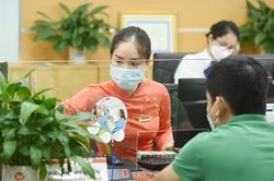 Đẩy mạnh cho vay, nhưng không hạ chuẩn