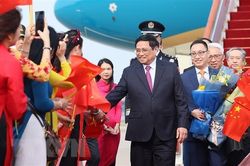 Thủ tướng tới Bắc Kinh bắt đầu thăm chính thức Trung Quốc, dự WEF