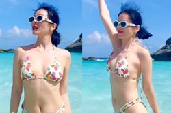 Lệ Quyên diện bikini bé tí nhảy nhót trên biển, tình trẻ kém 12 tuổi 'xuýt xoa'