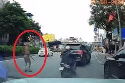 Xác định người đàn ông phi dao vào ô tô đang chạy ở Hà Nội