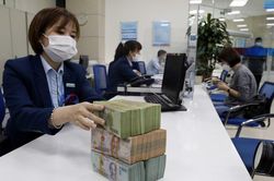 NIM các ngân hàng Việt từ 3 - 3,5%