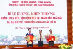 Khen thưởng huấn luyện viên, xạ thủ đạt Huy chương Vàng Asiad 19