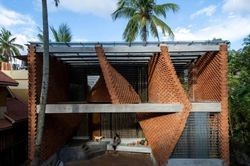 Kiến trúc sư của bùn và rác