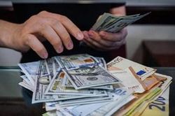 Tỷ giá USD hôm nay (13-10): Đồng USD vụt tăng mạnh trở lại mốc 106