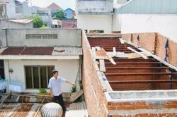 Xây nhà lấn sang đất của hàng xóm, xử lý thế nào?