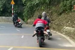 Thanh niên nằm trên yên xe điện đổ đèo Ba Vì
