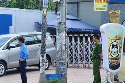 TPHCM: Hai thanh niên dùng súng cướp ngân hàng