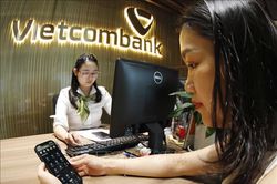 Ngành ngân hàng cơ cấu lại hệ thống các tổ chức tín dụng yếu kém còn chậm