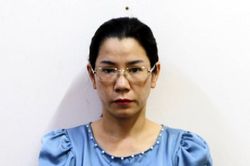 Tạm giữ hình sự nữ cán bộ văn phòng đất đai biến 6 sổ đỏ của dân thành tên mình