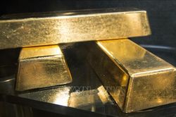 Giá vàng giảm nhẹ khi đồng USD bật tăng trở lại