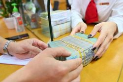 Giao dịch từ 400 triệu đồng phải báo cáo Ngân hàng Nhà nước