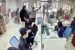 Đặc điểm nhận dạng kẻ mang dao và vật nghi lựu đạn vào cướp ngân hàng ở Nghệ An