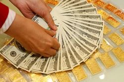 Vàng và USD tăng mạnh trước kỳ nghỉ Tết Nguyên đán