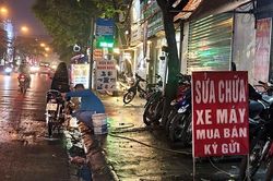 Sử dụng hè phố để rửa xe bị xử phạt thế nào?