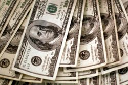 Đồng USD tự do tìm lại mốc 25.000 đồng/USD