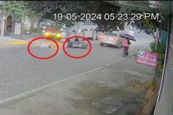 Clip: Đường trơn, lái xe máy văng về phía trước suýt bị xe tải cán qua