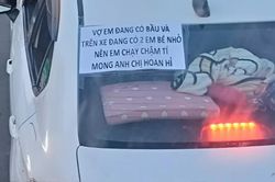 Chở vợ bầu trên ô tô, chồng có hành động không thể chê vào đâu được