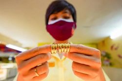 Giá vàng nhẫn trong nước suy yếu cùng vàng thế giới