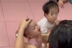 Công an vào cuộc vụ người phụ nữ cho trẻ ăn một cách thô bạo