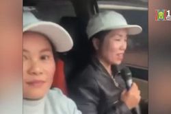 Nữ chủ nhà hàng tiệc cưới vừa lái xe vừa hát karaoke