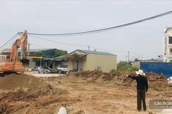 Ủy ban nhân dân cấp huyện có thẩm quyền thu hồi đất không?