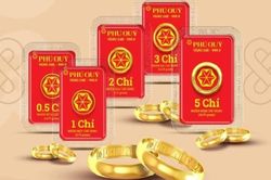 Giá vàng giảm sau thỏa thuận thương mại Mỹ-Anh