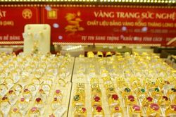 Giá vàng giảm mạnh, lùi sâu về mốc 119 triệu đồng/lượng
